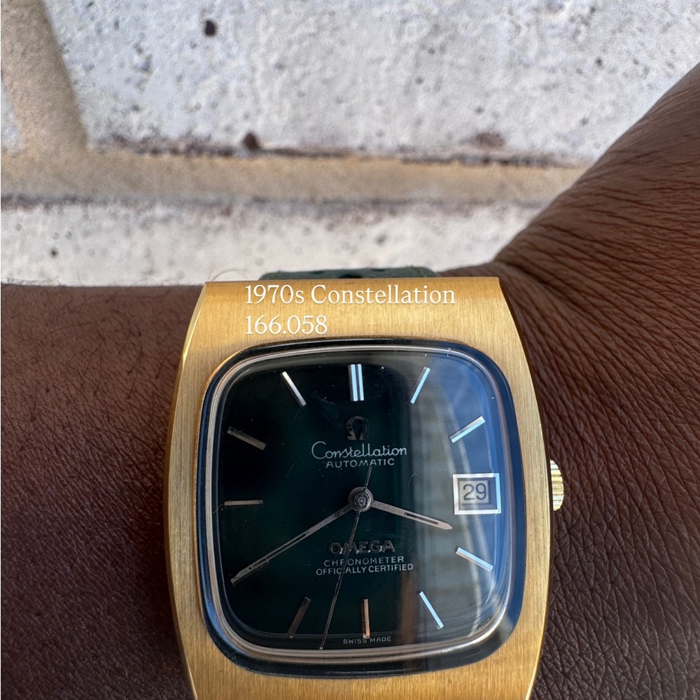 Omega Gold and Black Smartwatch with Square Face